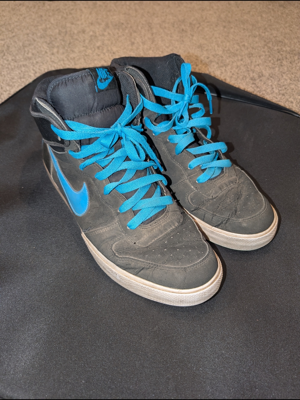 Nike Men’s High-Top Sneakers in Black with Blue Accents